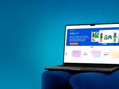 A laptop on a blue chair displays an Audaces webpage with a Looksmaker promotional banner and fashion images.