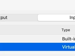 macOS Sound Output & Input settings with the Input tab selected and an “Aurio Microphone” virtual input device highlighted alongside the built-in microphone.