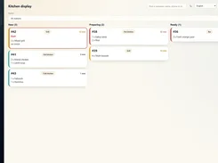 Bawabetna web dashboard showing a kitchen display with order cards arranged in New, Preparing, and Ready columns, plus a dark left navigation sidebar.