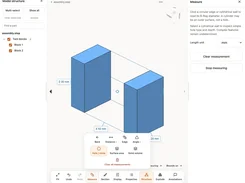 CADProps measurement interface showing a two-block 3D assembly, dimension callouts, model structure panel, and measurement controls.