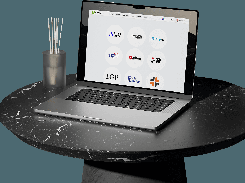 Laptop mockup showing a Capitalist page with circular logos for traffic and advertising platforms.