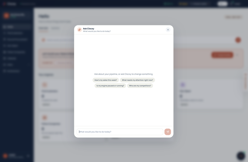 Clocsy interface with an Ask Clocsy assistant modal, suggested questions, a message field, and a blurred dashboard behind it.