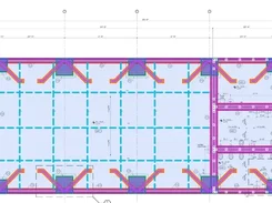Color-coded structural foundation plan with concrete areas, control joints, and reinforcement markings.