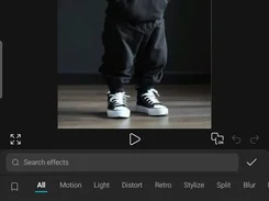 Cutpoeta effects screen showing a cat in a black tracksuit in the preview and effect options such as None, Shake, Flash, Pulse, Glitch, VHS, Old Film, and Rainbow.