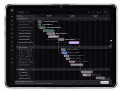 Tablet-framed Projects Gantt screen showing construction task groups, dependency lines, and a timeline from March through May 2026.