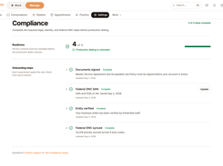 EmberDial Compliance page showing four completed onboarding controls and production dialing unlocked.