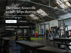 Screenshot of a Demo Personal Training website template with a gym hero image, booking controls, navigation, and trainer feature text.
