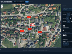 Florivio incident board over a satellite map, with fire-engine and command icons, marked incident locations, drawing tools, personnel-rescue counters, and vehicle status panel.