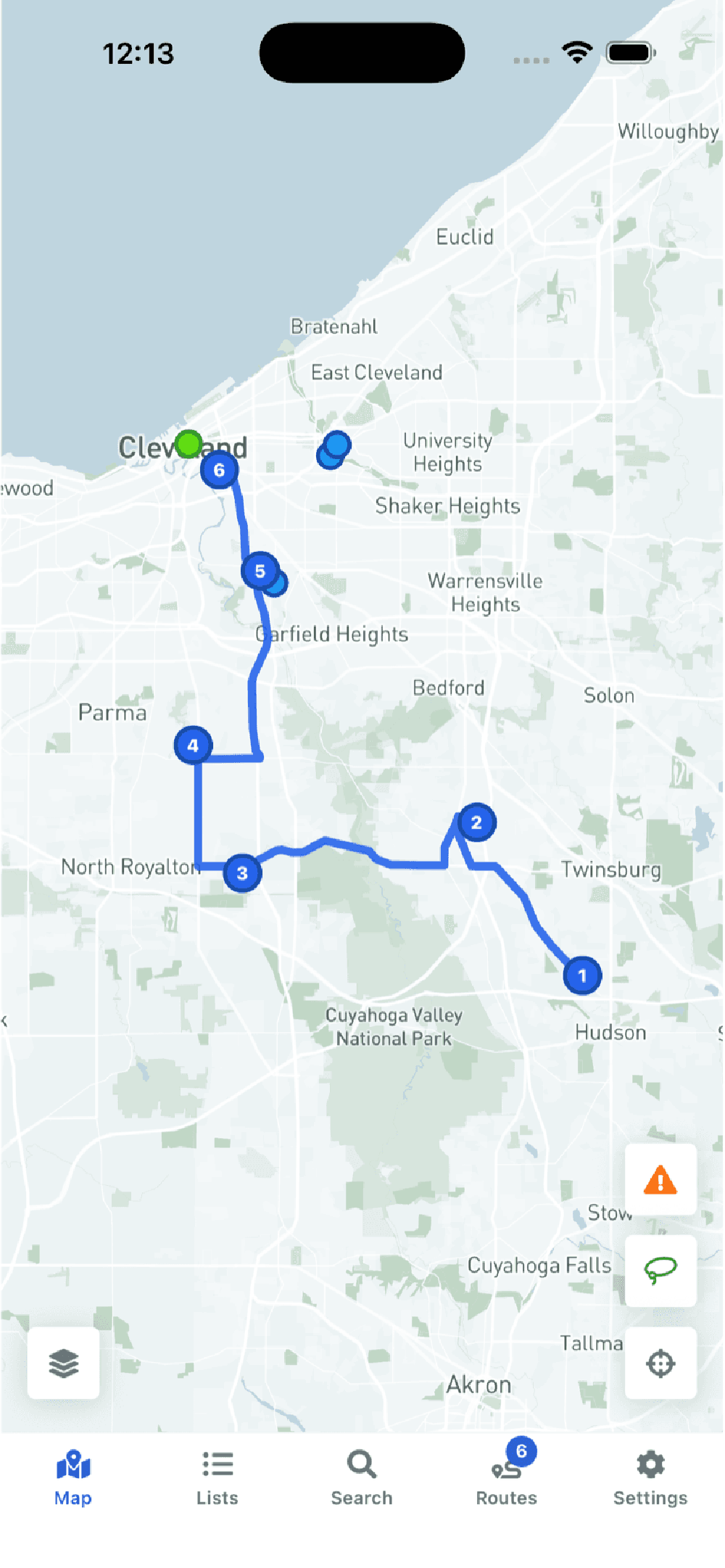 Mobile mapping app screen showing a blue numbered route with six stops between Hudson, Cleveland, and nearby Ohio locations, plus bottom navigation for Map, Lists, Search, Routes, and Settings.