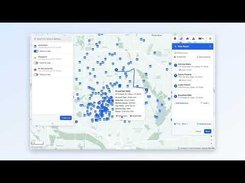 Video-frame-style image showing a desktop mapping interface with many blue location markers, a left layer panel, a central record popup, and a right-side list panel.