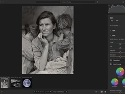 Dark photo-editing workspace displaying a black-and-white photograph of a woman with children, alongside color adjustment controls.