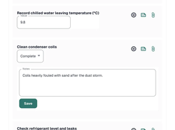 Checklist on a work order: record discharge pressure 21.4 bar, record chilled water leaving temperature 9.8°C, clean condenser coils complete with the note Coils heavily fouled with sand after the dust storm, and check refrigerant level and leaks passed.