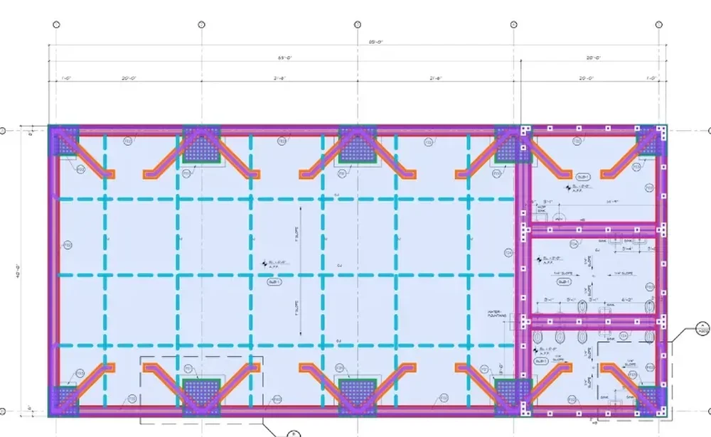 CAD workspace showing a structural floor plan with colored framing and dimension annotations.