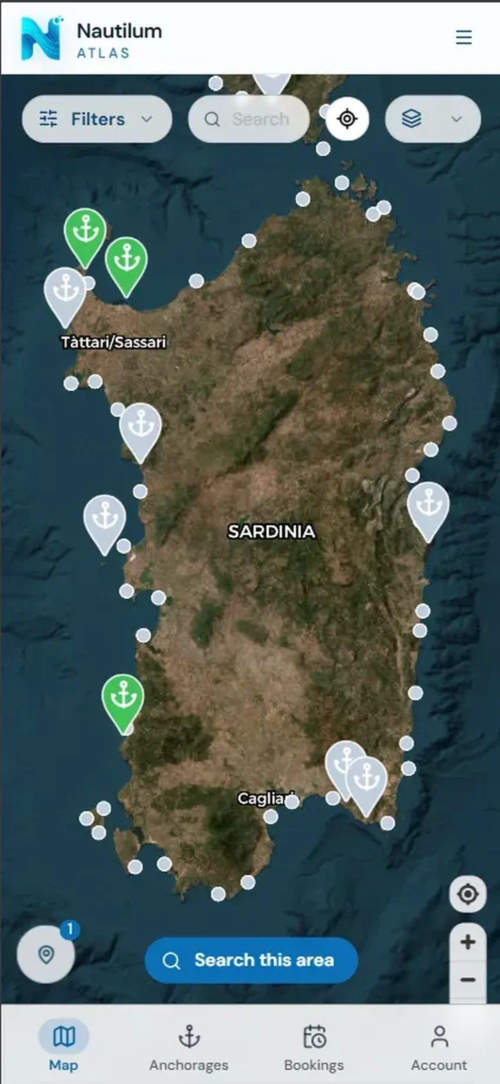 Nautilum Atlas mobile map showing Sardinia with anchor-shaped location pins, filters, search, and bottom navigation.