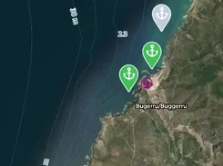 Nautilum Atlas mobile map centered on the Buggeru/Buggerru coast, showing anchorage pins, depth contours, and map/list controls.