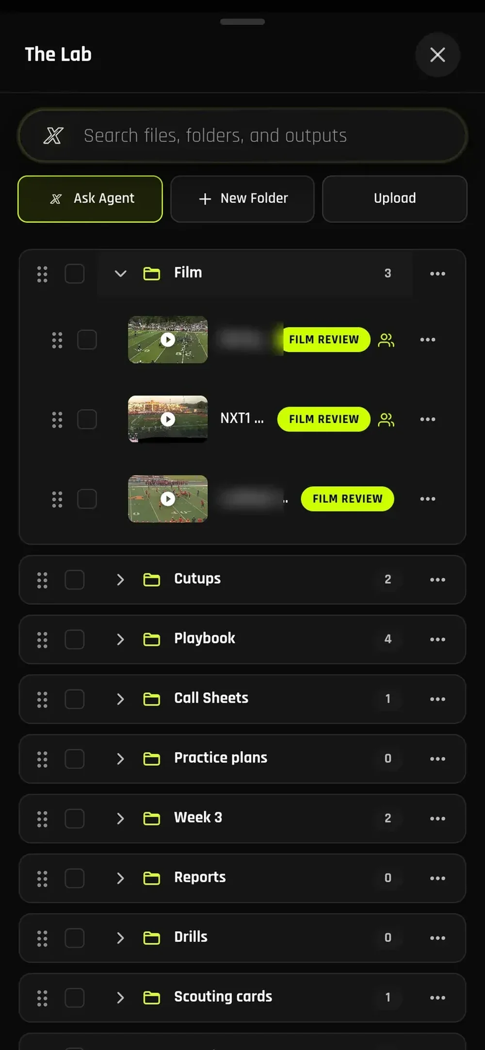 Dark mobile interface for The Lab showing folders for film, cutups, playbook, call sheets, reports, drills, and scouting cards, with video thumbnails and Film Review buttons.