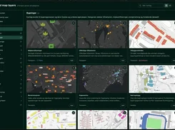Placepoint's dark map-layer catalog shows category filters and cards for building, environmental, traffic, company, and business map layers.