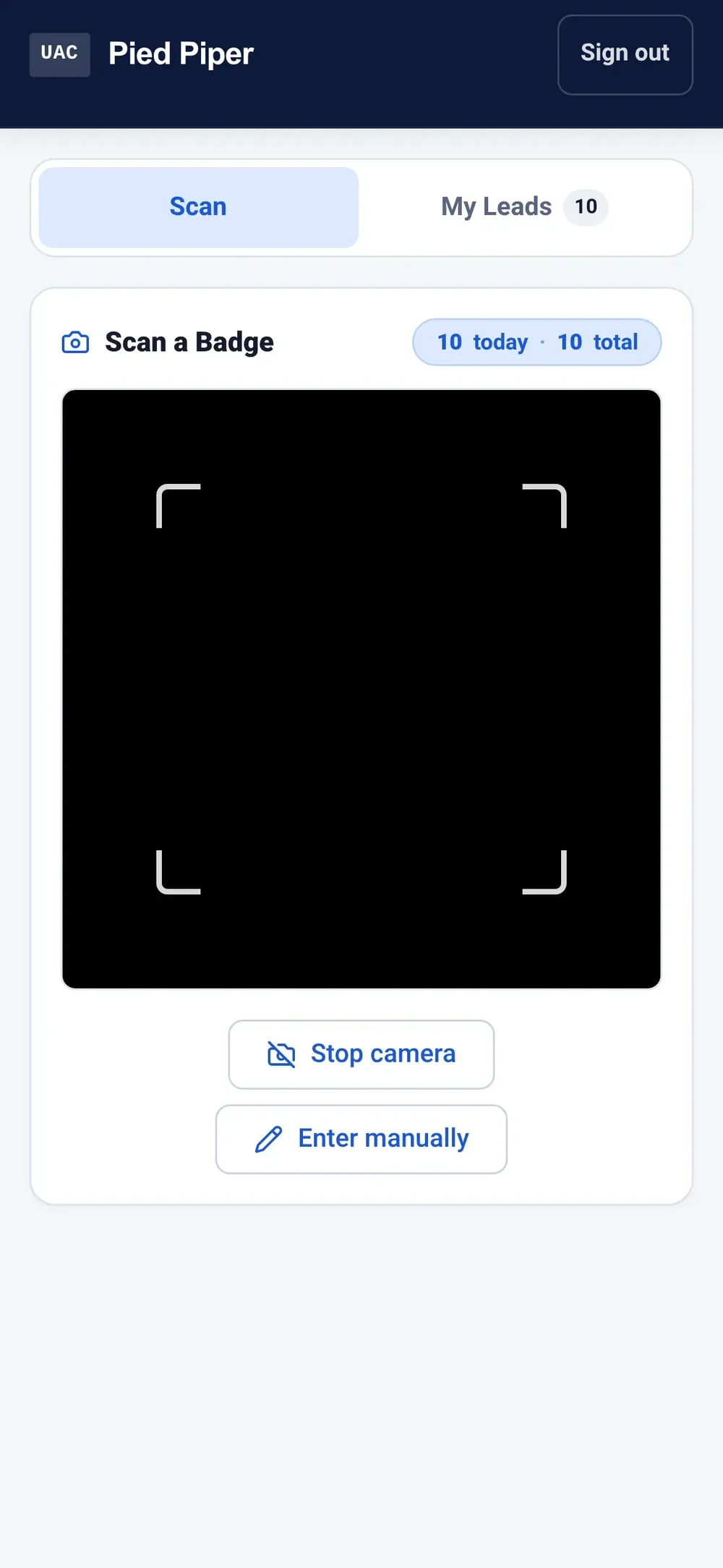 Mobile Scan tab with a badge-scanning camera frame, scan totals, and buttons to stop the camera or enter details manually.
