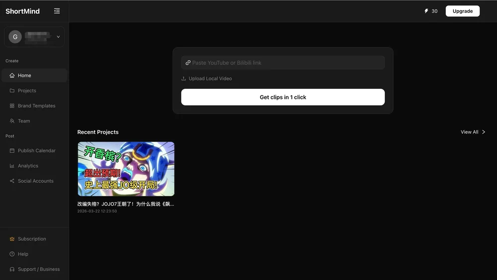 ShortMind home dashboard with a field to paste a YouTube or Bilibili link or upload a local video, a Get clips in 1 click button, and a Recent Projects card.