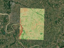 Satellite image of farmland and a winding river with a large square false-color raster overlay.