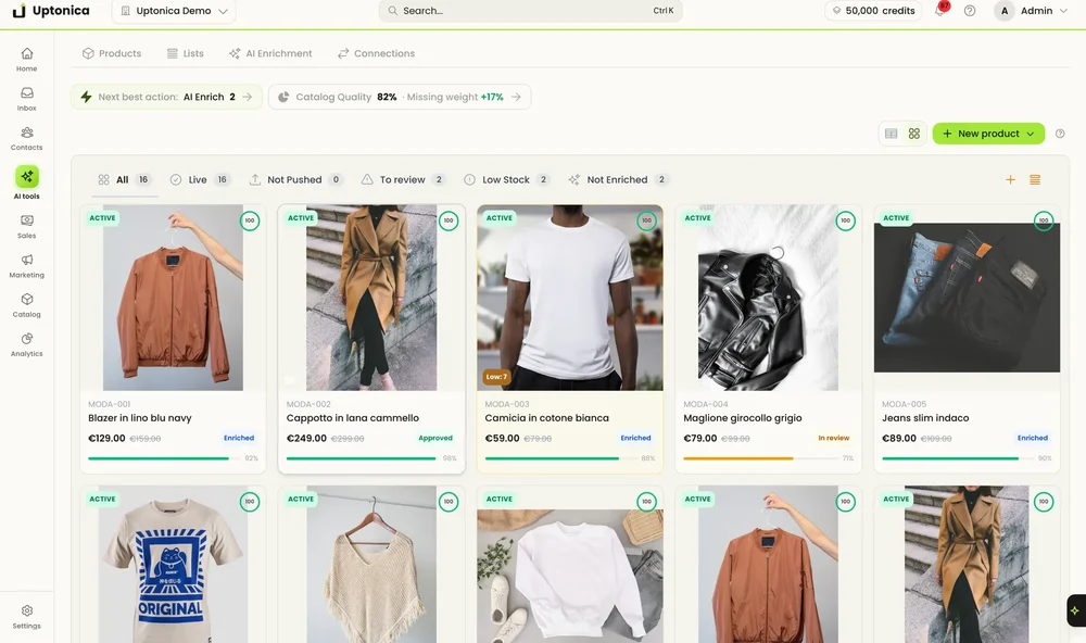 Uptonica catalog dashboard in grid view showing apparel product cards, catalog-quality metrics, inventory status, prices, and enrichment progress.
