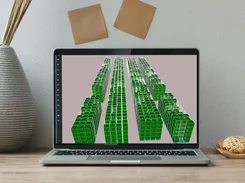 3D warehouse layout view with color-coded storage locations displayed on a laptop.