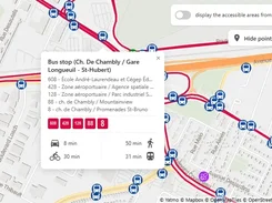 Yatmo map interface showing transit routes and bus-stop markers, with a popup for Bus stop Ch. De Chambly / Gare Longueuil - St-Hubert and travel times.