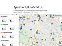 Property-page view titled "Apartment, Rue de la Loi" with a neighborhood map, a blue location pin, and a panel listing nearby nurseries, preschools, elementary schools, and high schools.